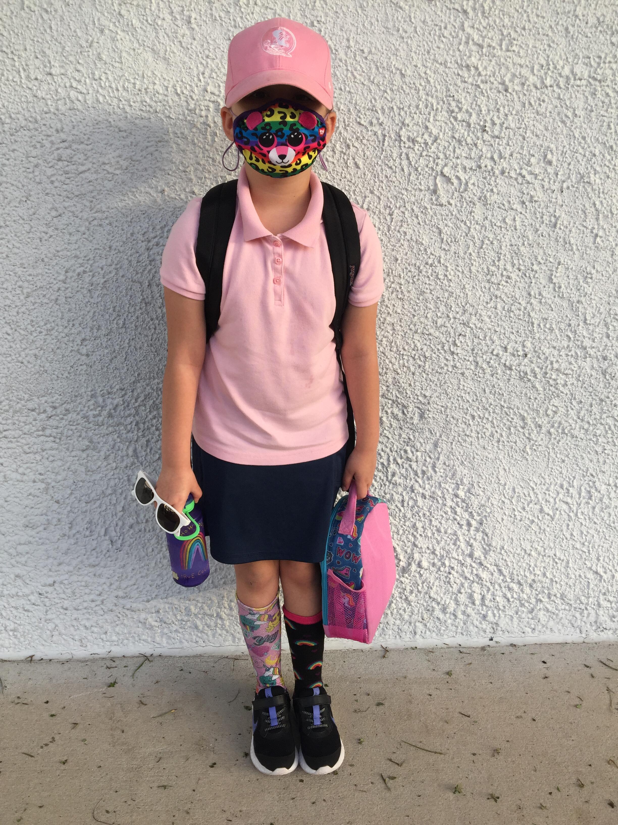student wearing crazy hat and socks 
