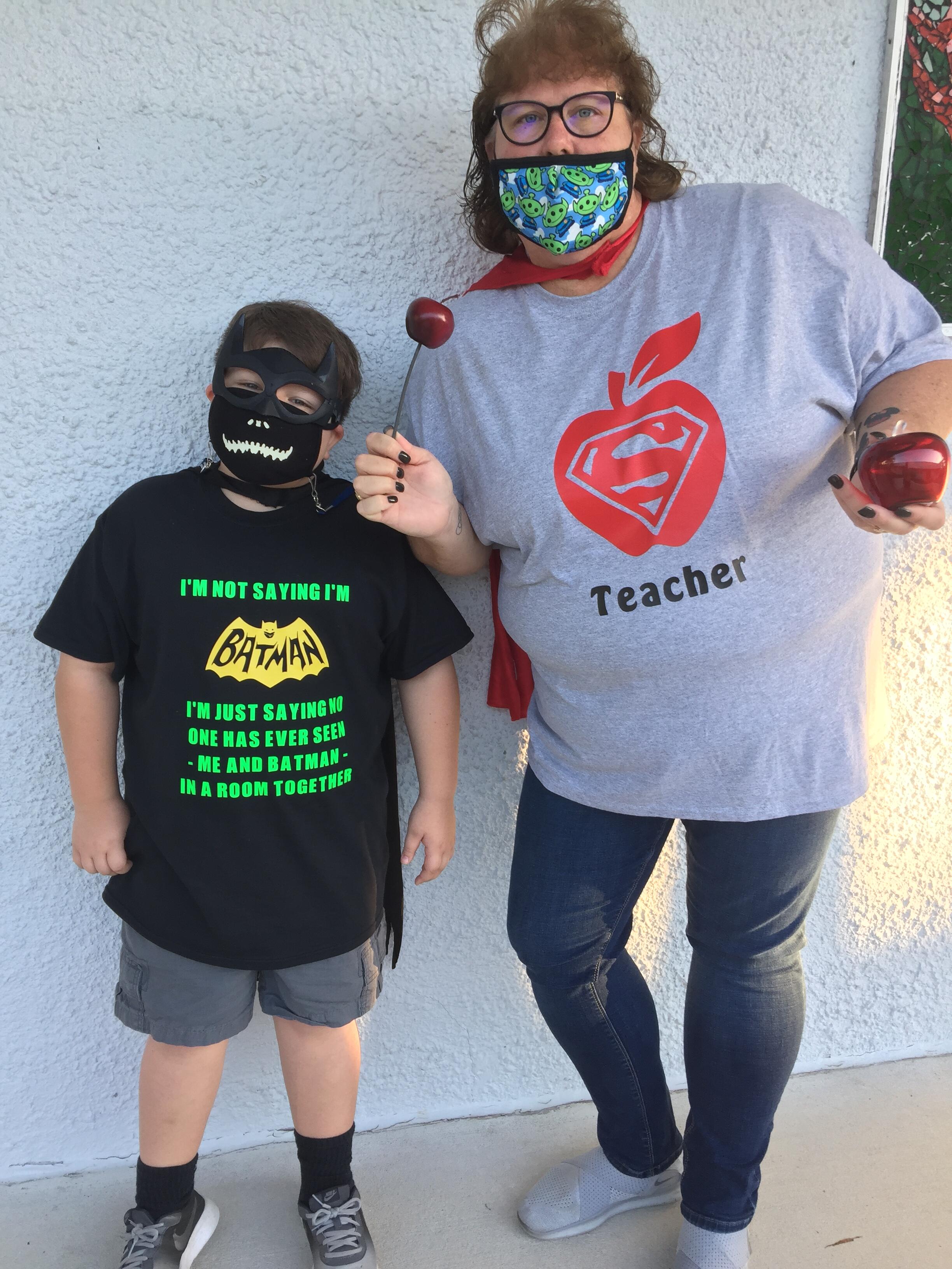 Teacher Mrs. White with Student dressed in super hero shirts 